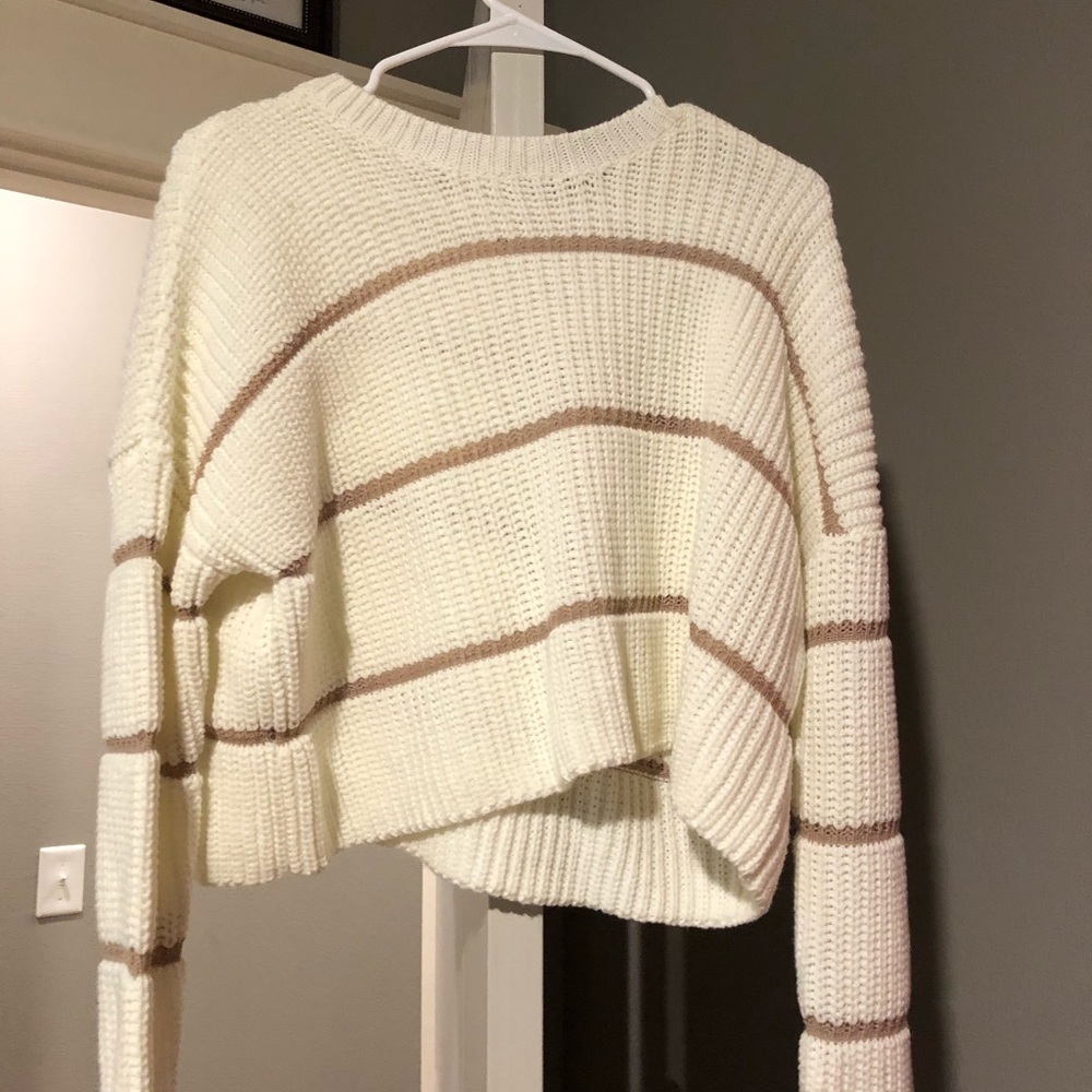 this is an extra small shirt, it is white with light brown lines